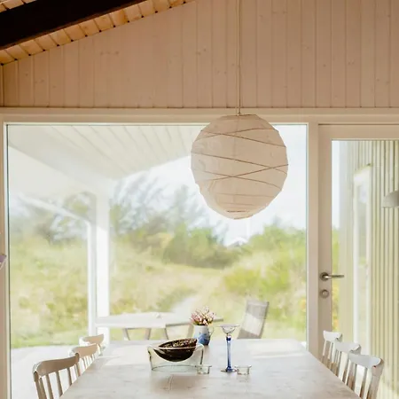 Family In Heather-clad Landscape
